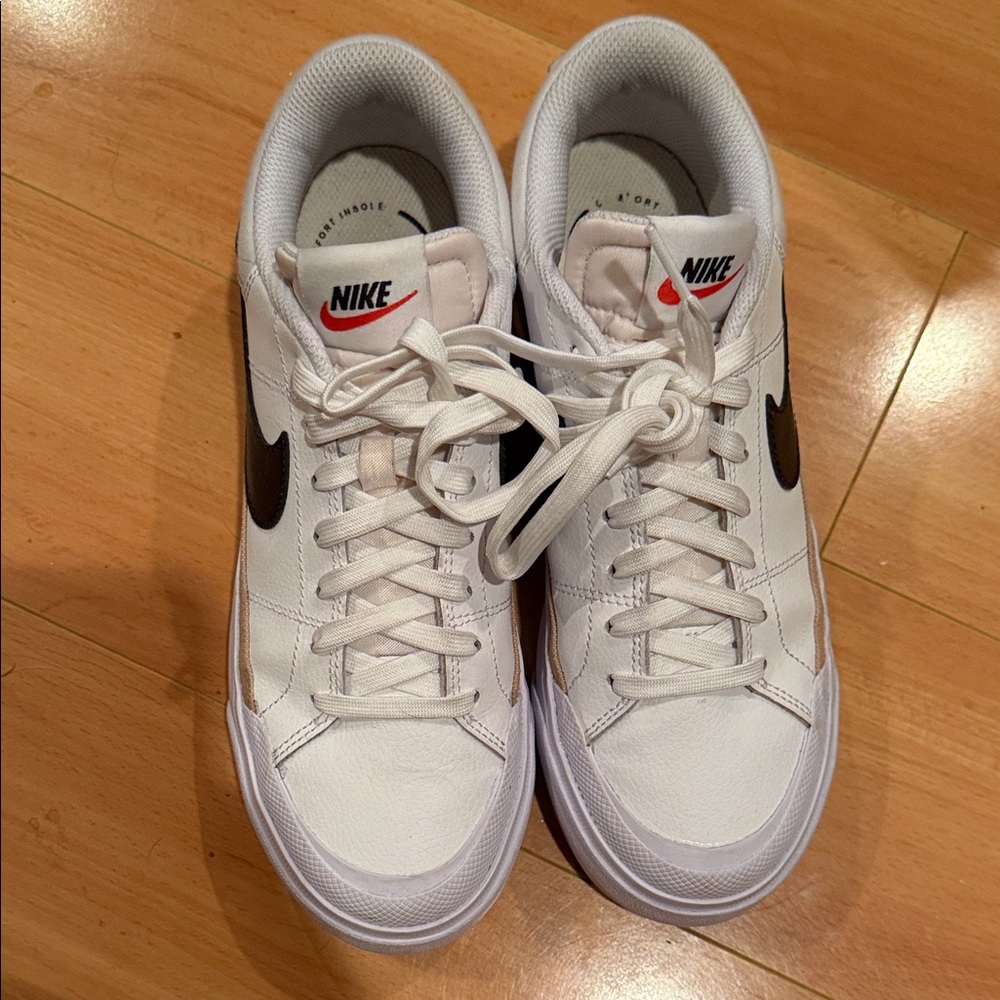 Nike White Sneakers with Black Swoosh